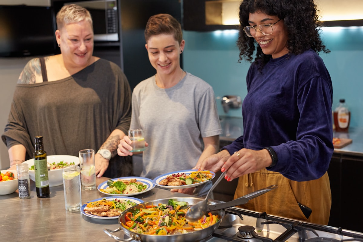 Students preparing colorful vegetable dishes